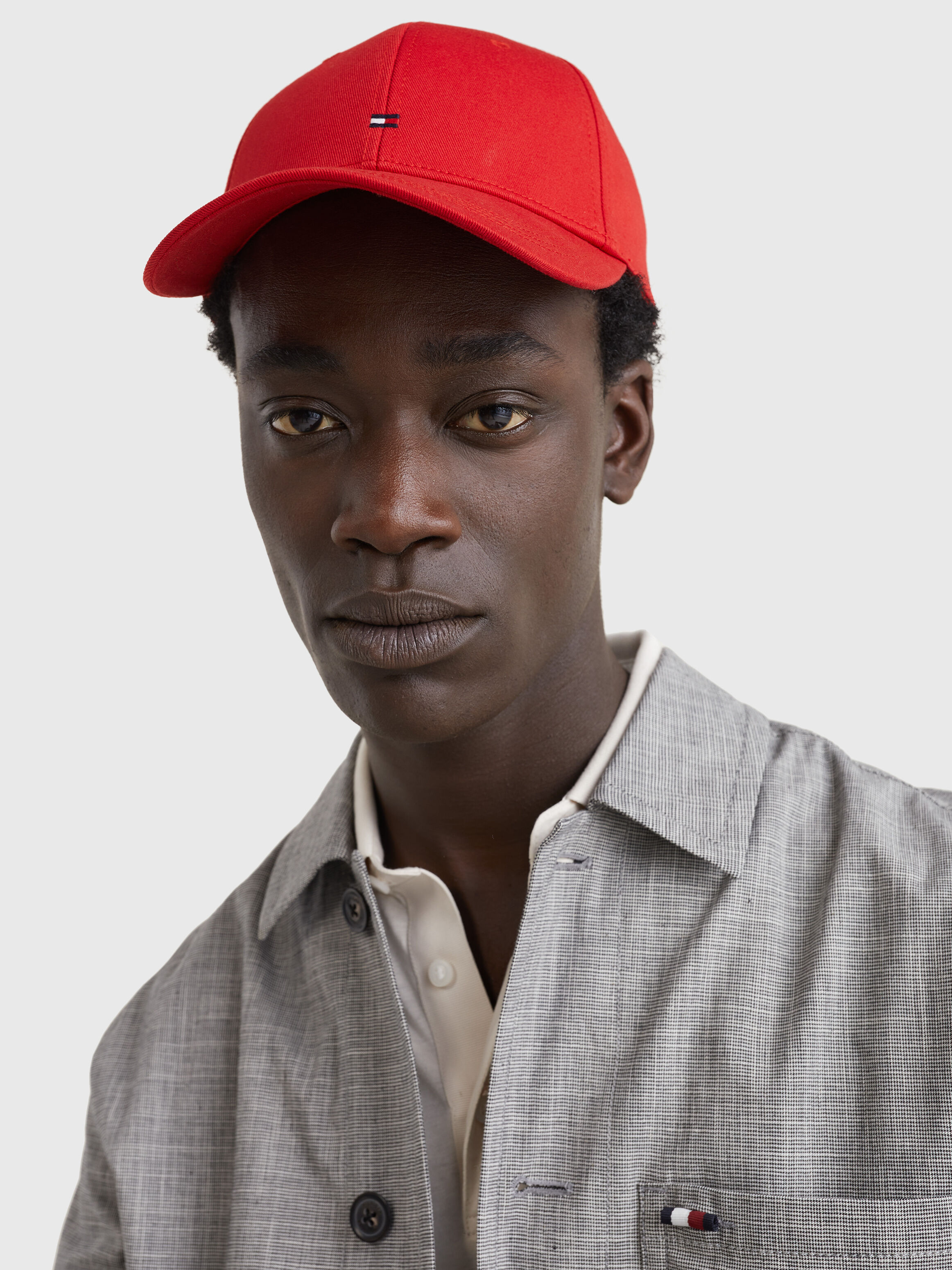 Baseball cap with button up shirt top