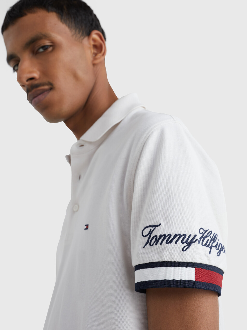 TOMMY HILFIGER - Men's slim polo shirt with signature cuffs - Ivory -  MW0MW30764AC0